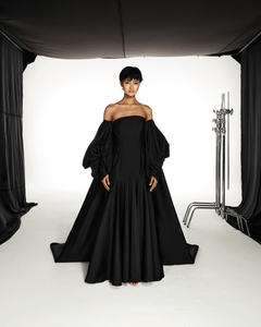 BLACK TUBE FLARED DRESS WITH EXAGGERATED SLEEVE CAPE